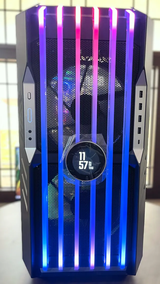 Custom PC with RGB light bars and a built-in front display